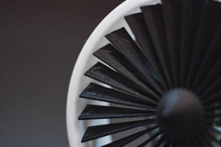A closeup shot of table fan isolated on black background